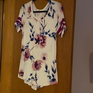 24/7 floral top white with pink flowers.